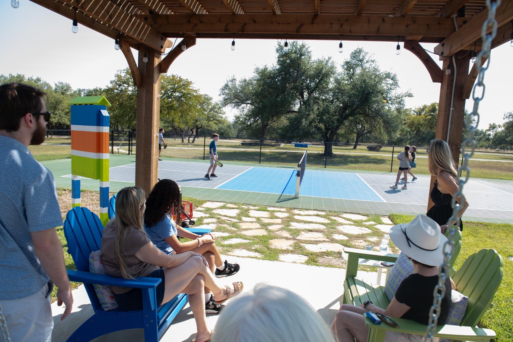 Guests enjoying the pickleball court at The Gathering
